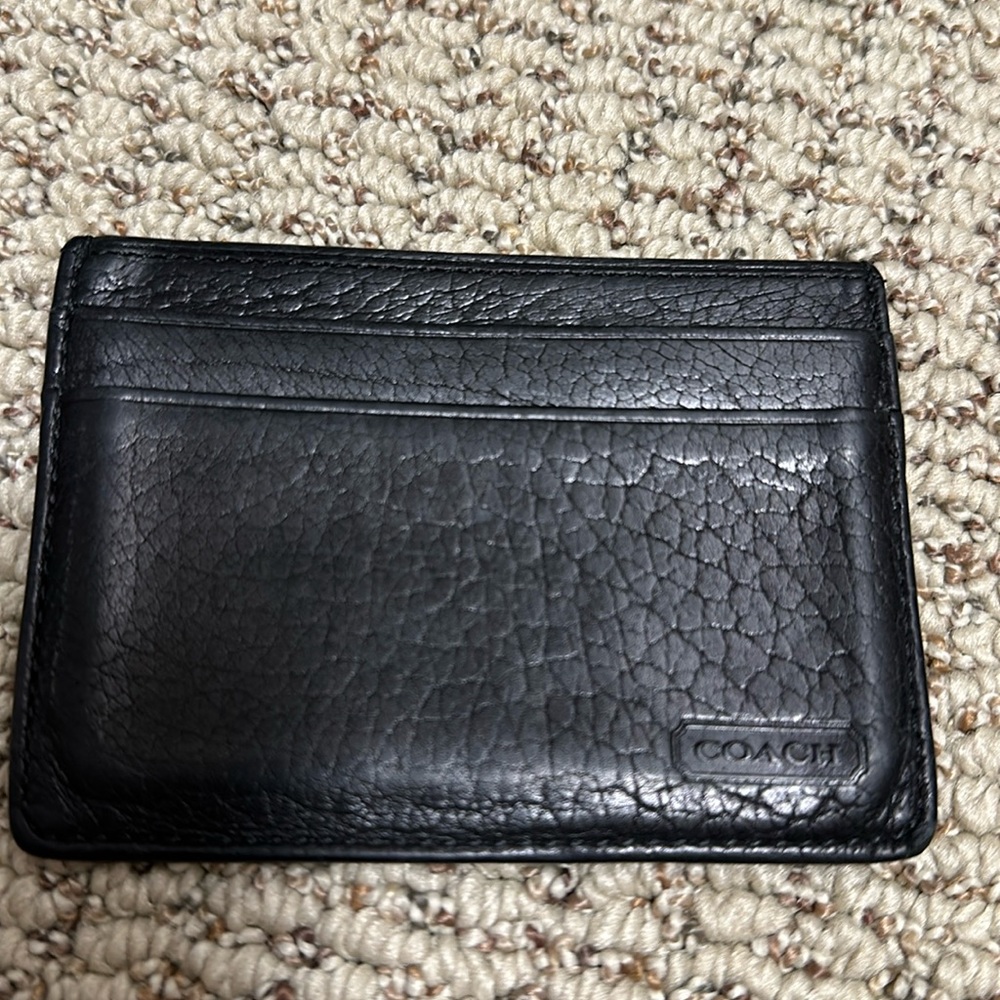 Coach black leather card holder wallet.